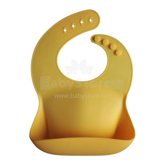 Mushie Silicone Bib Art.2500109 Yellow Kūdikio seilinukas pagamintas iš 100 % aukštos kokybės silikono