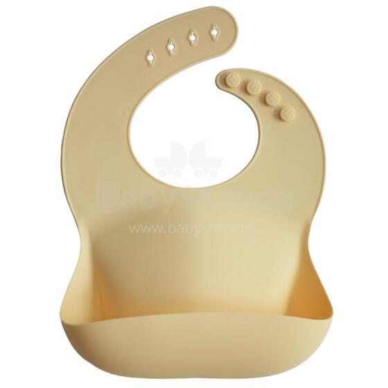Mushie Silicone Bib Art.2500198 Yellow  Kūdikio seilinukas pagamintas iš 100 % aukštos kokybės silikono