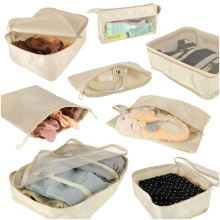 Ikonka Art.KX4110 Koferis organizatori ceļojumu komplekts 8 gab apģērbu uzglabāšanas piederumi ūdensizturīgas somas kosmētikas maisiņš apavu soma bēšs
