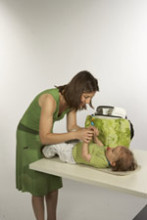 Hoppop Original Flower Power Autiņu soma, kas transformejas uz bērnu sēdekli (Soma-bērnu sēdeklis)