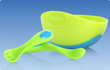 Nuby 5327 Sure Grip™ Bowl A bowl with a spoon and a fork